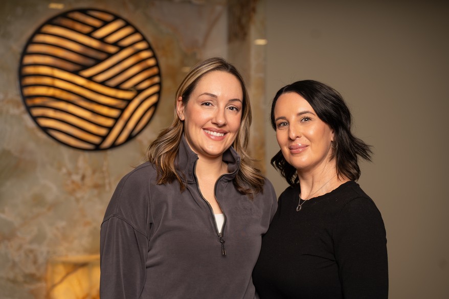 Tiffany Rossi and Beth Zeilstra smiling together at Refined